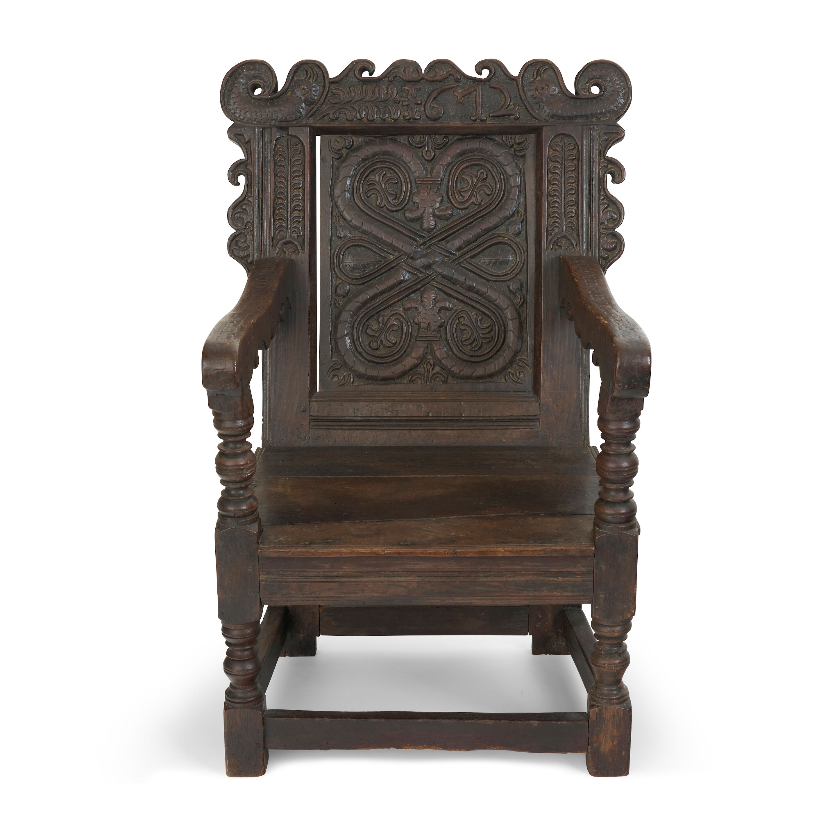 An English 17th century oak wainscot armchair