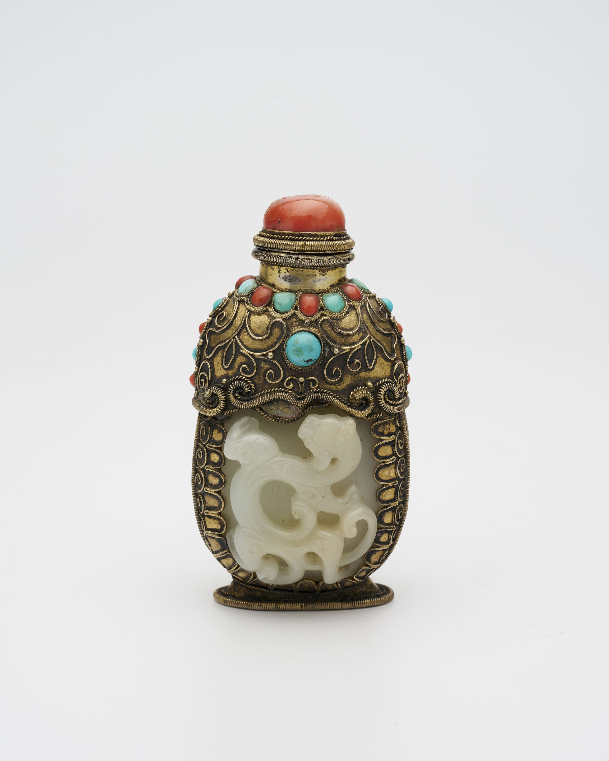 A WHITE JADE 'CHI-DRAGON' SNUFF BOTTLE WITH INLAID AND GILT COPPER ENCASING 18th/19th century