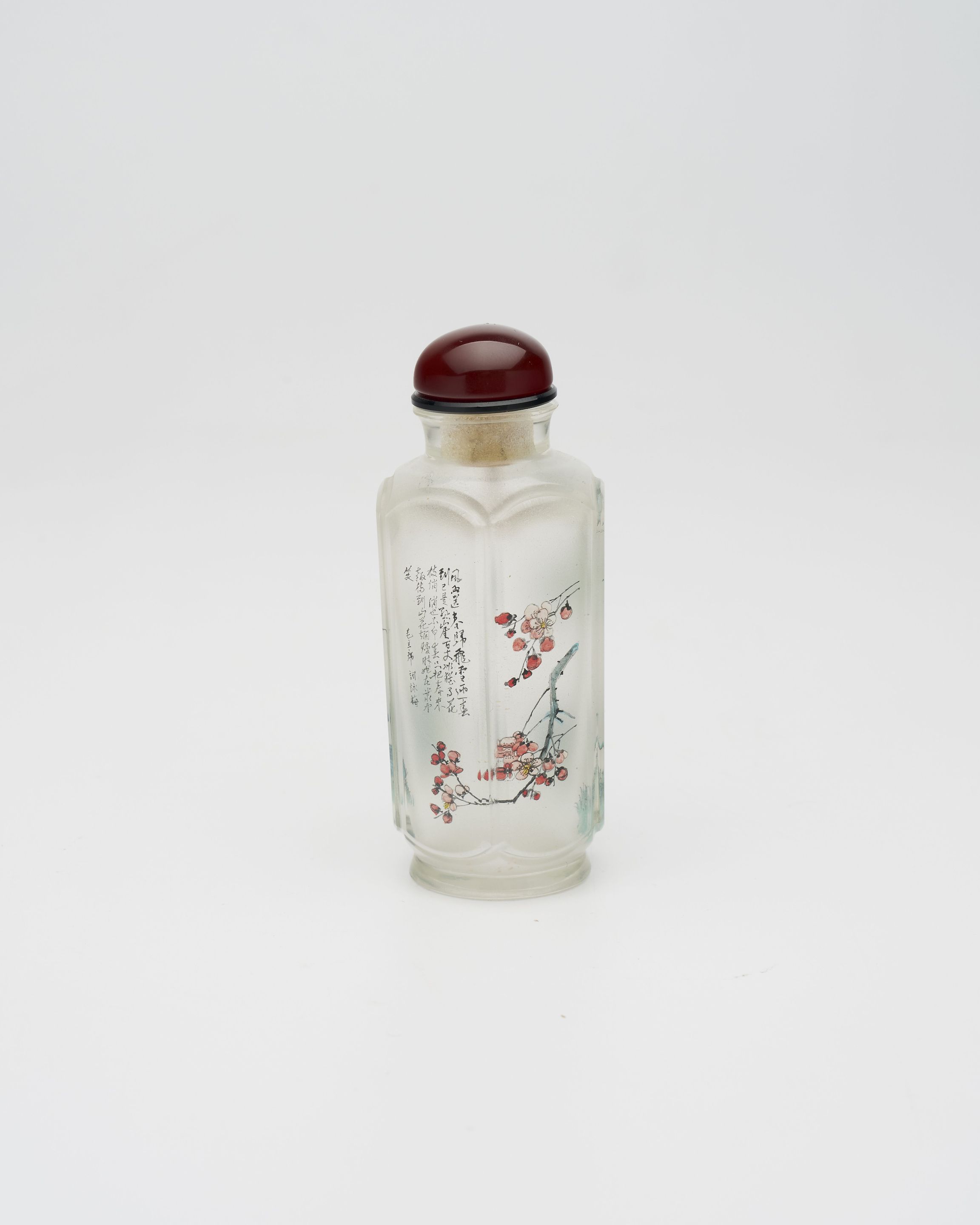 AN INSIDE PAINTED HEXAGONAL GLASS 'ORCHID AND BAMBOO' SNUFF BOTTLE 1970s