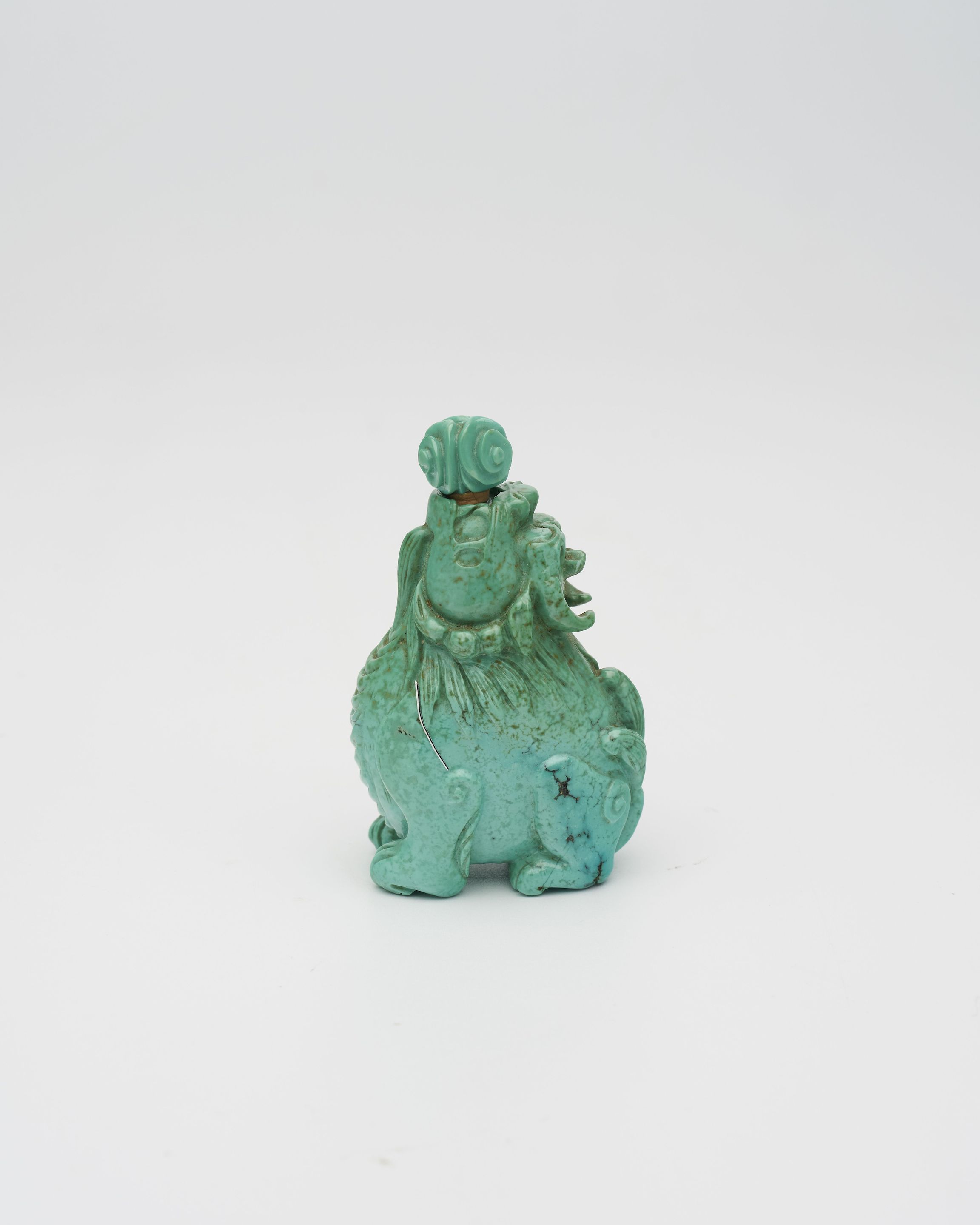 A TURQUOISE 'QILIN' SNUFF BOTTLE Late Qing to Republic Period