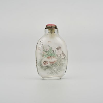 AN INSIDE PAINTED GLASS 'CAT AND BUTTERFLY' SNUFF BOTTLE IN THE STYLE OF CAO KEJIA (1906-1979) Dated by inscription dingmao year, 1987