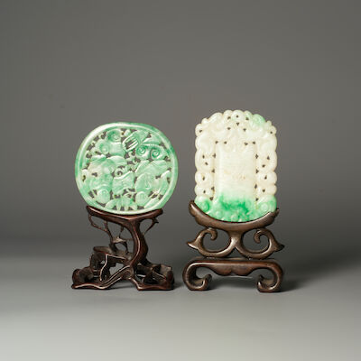 A JADEITE 'HEHE ERXIAN' AND A 'DRAGON' PENDANT 19th/20th century (2)