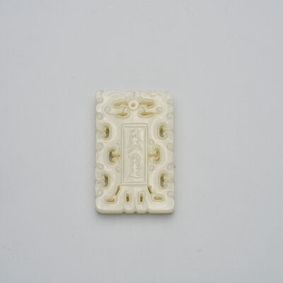 A GREENISH WHITE JADE ABSTINENCE PLAQUE 19th/20th century
