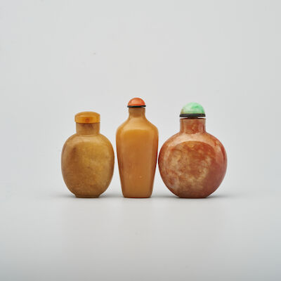 THREE BROWN JADEITE SNUFF BOTTLES 19th/20th century (3)