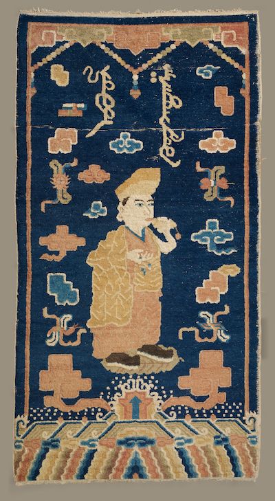 AN INDIGO 'LAMA' PILLAR RUG Ningxia, 19th century
