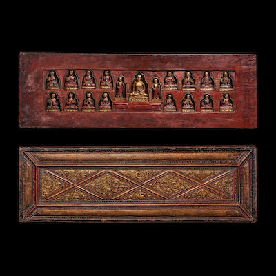 A GILT LACQUERED AND POLYCHROMED WOOD SUTRA COVER NEPAL, CIRCA 15TH CENTURY